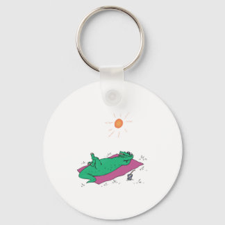 sun tanning crocodile keychain