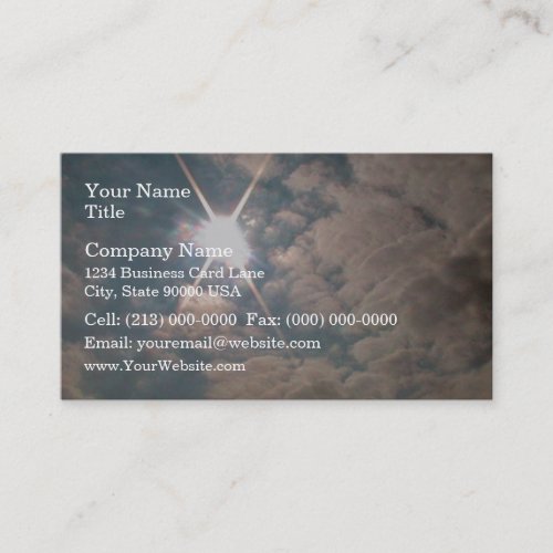 Sunburst through white clouds business card templates