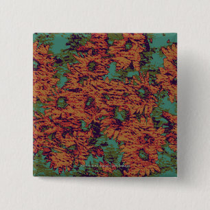 Sunflower and leaf camouflage pattern on pinback button
