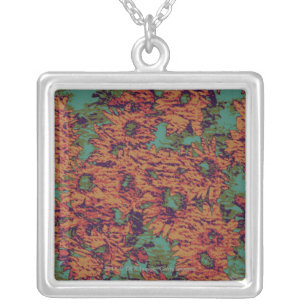 Sunflower and leaf camouflage pattern on silver plated necklace