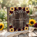 Sunflower and Roses Wedding Photo Album 3 Ring Binder<br><div class="desc">This rustic sunflower and burgundy roses country photo album binder is perfect for displaying your wedding photos. This design features watercolor sunflowers and roses with sage greenery and string light accents on a wood background. Personalize with your names and wording.</div>