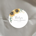 Sunflower Eucalyptus Floral Thank You Favor Classic Round Sticker<br><div class="desc">Create a modern Sunflower Floral thank you favor sticker with this cute template featuring beautiful rustic floral bouquet, geometric gold effect leaves, with modern simple typography. TIP: Matching wedding suite cards like RSVP, wedding programs, banners, tapestry, gift tags, signs, and other wedding keepsakes and goodies are available in the collection...</div>
