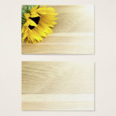 Sunflower laying on a wooden table (Front & Back)