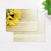 Sunflower laying on a wooden table (Desk)