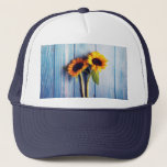 Sunflower on Blue Wood Wall Trucker Hat