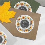 Sunflower Pumpkin Rustic Chalkboard Couples' Names Classic Round Sticker<br><div class="desc">The perfect rustic country personalized stickers for the fall wedding season! Weathered barn wood and chalkboard are accented by festive sunflowers and harvest pumpkins in watercolor styling. Unique specialty wedding theme for October and November wedding dates. • Browse the Harvest Wedding Collection below to see all coordinating products in this...</div>