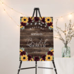 Sunflower Rustic Wood Bridal Shower Welcome Sign<br><div class="desc">This sunflower and burgundy roses rustic bridal shower welcome sign is perfect for a spring or summer garden wedding shower. This collection features watercolor roses with sage eucalyptus greenery on a barn wood background with string lights. Coordinating welcome signs compliment your bridal shower décor. Make this sign your own by...</div>