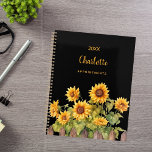 Sunflowers black 2025 planner<br><div class="desc">Embrace your organizational skills with our Personalized Sunflower Garden Spiral Planner. Perfect for staying on top of your schedule with a touch of rustic charm, this planner combines functionality with a beautiful and personalized design. Elegant Black Background: The sophisticated black backdrop provides a striking contrast, making the vibrant watercolor sunflowers...</div>