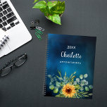 Sunflowers yellow blue sky name 2025 planner<br><div class="desc">Stay organized and inspired throughout the year with our Personalized Sunflower and Eucalyptus Spiral Planner. Designed to bring a touch of nature's beauty to your daily planning, this spiral-bound planner combines functionality with personalized flair. Stunning Dark Blue Sky Background: The deep blue sky backdrop sets a serene and calming tone,...</div>