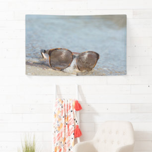 Sunglasses on the beach banner