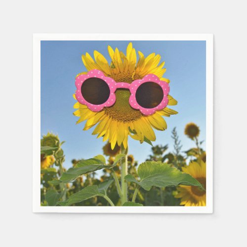 sunglasses on yellow sunflower napkins