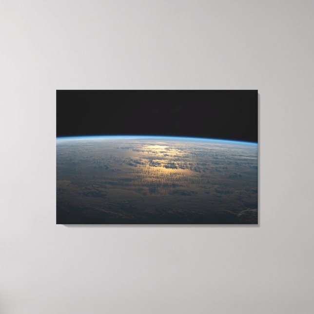 Sunglint Beams Off A Partly Cloudy South Pacific Canvas Print (Front)