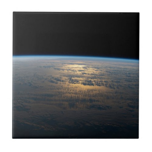 Sunglint Beams Off A Partly Cloudy South Pacific Ceramic Tile