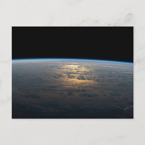 Sunglint Beams Off A Partly Cloudy South Pacific Postcard