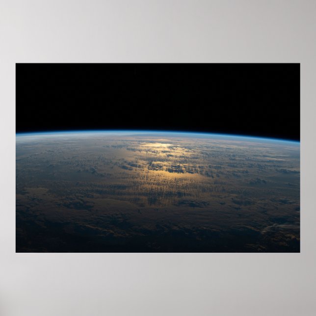 Sunglint Beams Off A Partly Cloudy South Pacific Poster (Front)