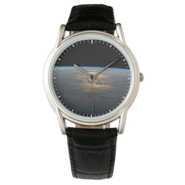 Sunglint Beams Off A Partly Cloudy South Pacific Watch (Front)