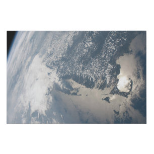 Sunglint On The Waters Of Earth. Faux Canvas Print