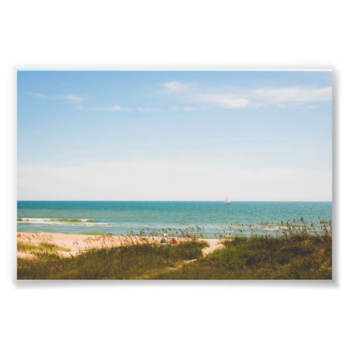 Sunny Ocean View with Beach Umbrella and Sailboat Photo Print