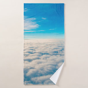 Sunrise above clouds from airplane window bath towel