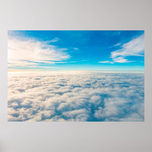 Sunrise above clouds from airplane window poster
