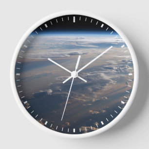 Sunrise Casts Long Shadows Over Philippine Sea Clock