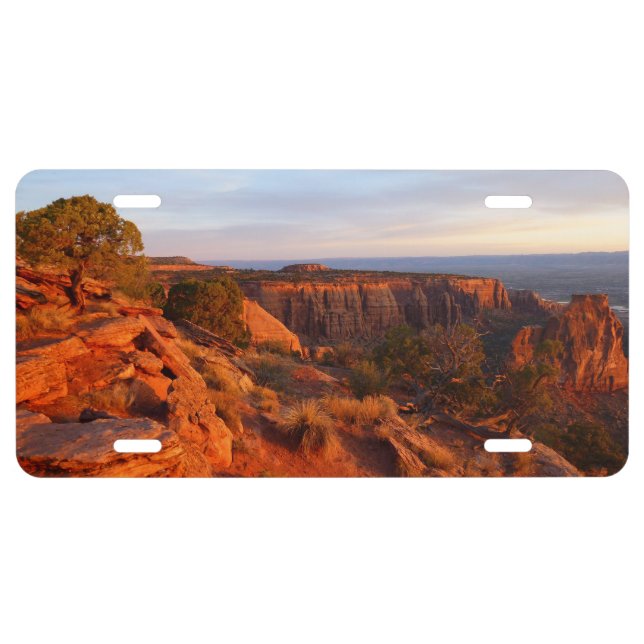 Sunrise on the Grand View Trail at CO Monument License Plate (Front)