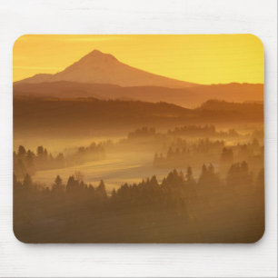 Sunrise orange colors the fog in the valley in mouse pad