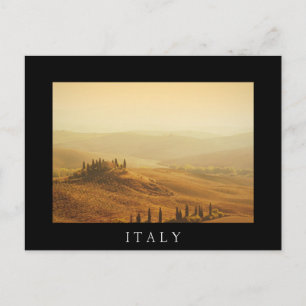 Sunrise over a landscape in Tuscany black postcard