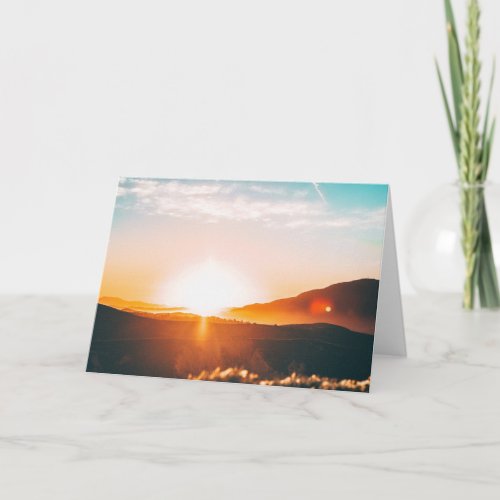 sunrise over a mountain card