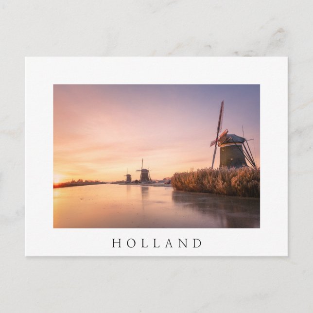 Sunrise over frozen river with windmills and reeds postcard (Front)