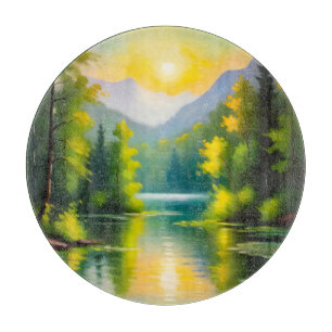 Sunrise over snow covered mountains and lake cutting board