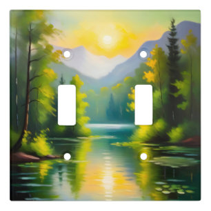 Sunrise over snow covered mountains and lake light switch cover
