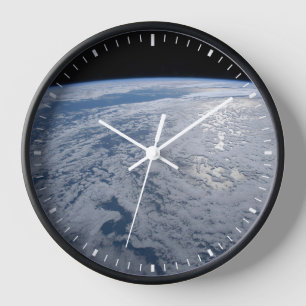 Sun's Glint Beaming On The South Pacific Ocean. Clock