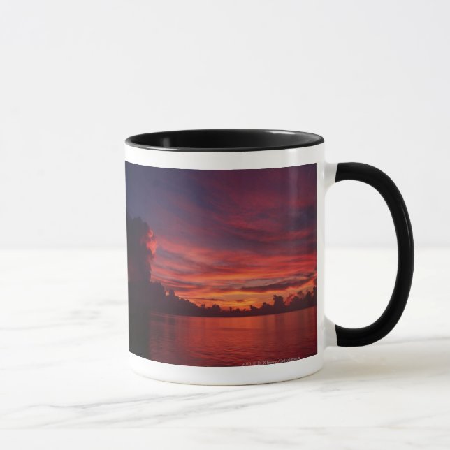Sunset at sea with dark clouds mug (Right)