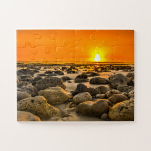 Sunset at the rocky beach jigsaw puzzle