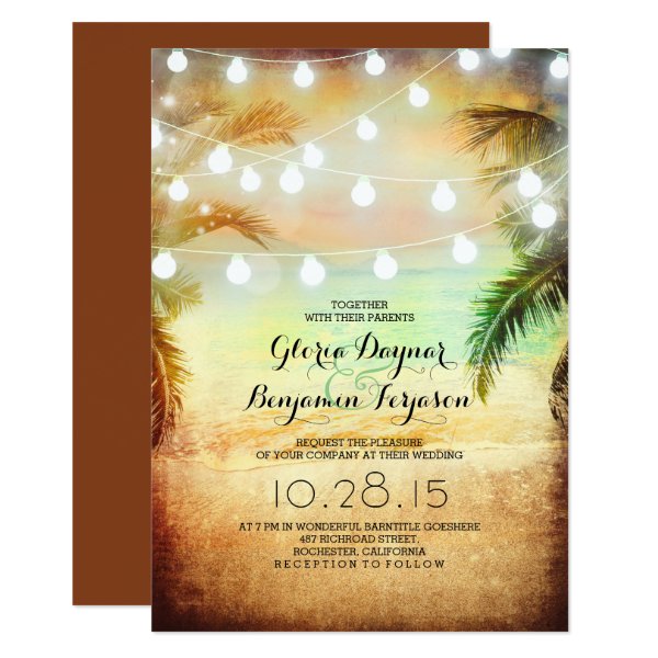 256650864827287500 Sunset Beach & String Lights Wedding Invitation