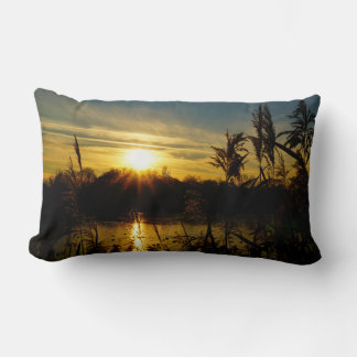 Sunset by a small lake with reed plumes. lumbar pillow