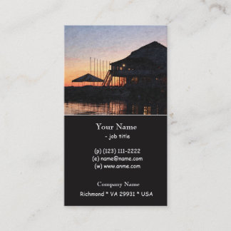 sunset by the lake waterfront with deck buildings business card
