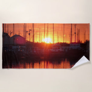 Sunset Glow in Water Beach Towel