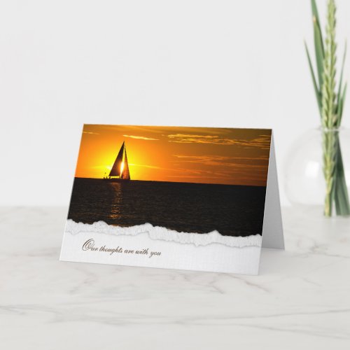 sunset glow with sailboat on water for sympathy card