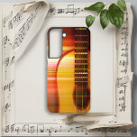 Sunset Harmony Acoustic Guitar Samsung Galaxy S22 Case<br><div class="desc">Experience the stunning blend of a breathtaking sunset's warm colors intertwined with the sleek curves of a guitar. Perfect for music enthusiasts who appreciate a seamless mix of artistic beauty and practical design.</div>