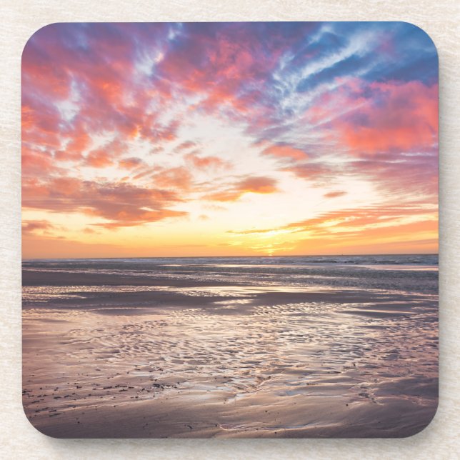 Sunset over beach and sea beverage coaster (Front)
