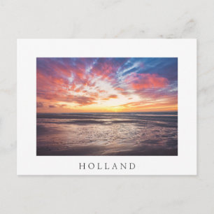 Sunset over beach and sea postcard