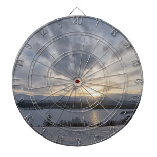 Sunset over frozen lake dart board