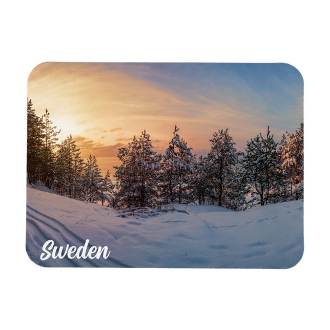 Sunset over frozen snowy forest near magnet (Horizontal)