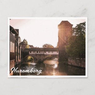 Sunset over medieval bridge in Nuremberg, Germany Postcard