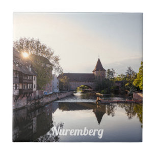 Sunset over old medieval bridge in Nuremberg Ceramic Tile