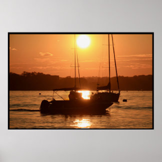 Sunset over Sailboats Poster