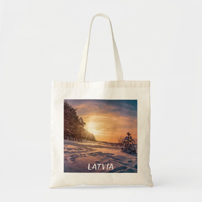 Sunset over snowy winter sea coast tote bag (Front)