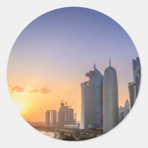 Sunset over the city of Doha Qatar Classic Round Sticker